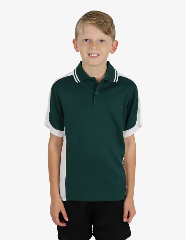 A young boy wearing a green polo shirt with white accents and a logo.