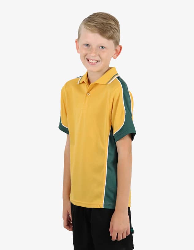 A yellow polo shirt with green accents and a logo, modelled by a smiling child.