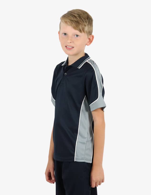 A polo shirt in navy and grey, featuring a logo, worn by a smiling young boy.