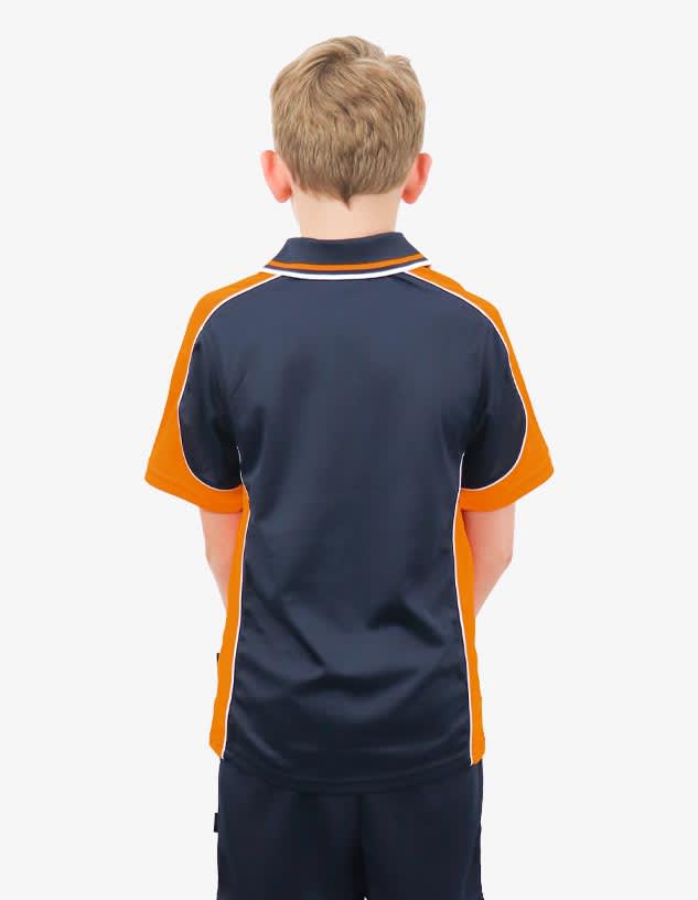 A boy wearing a navy blue and orange polo shirt, viewed from the back, featuring a logo.