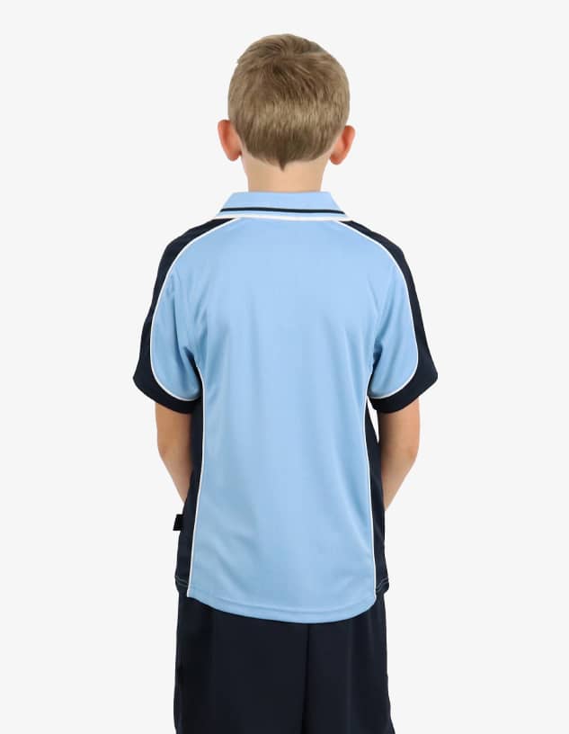 A boy is wearing a blue and black polo shirt, viewed from the back, featuring a logo on the sleeve.
