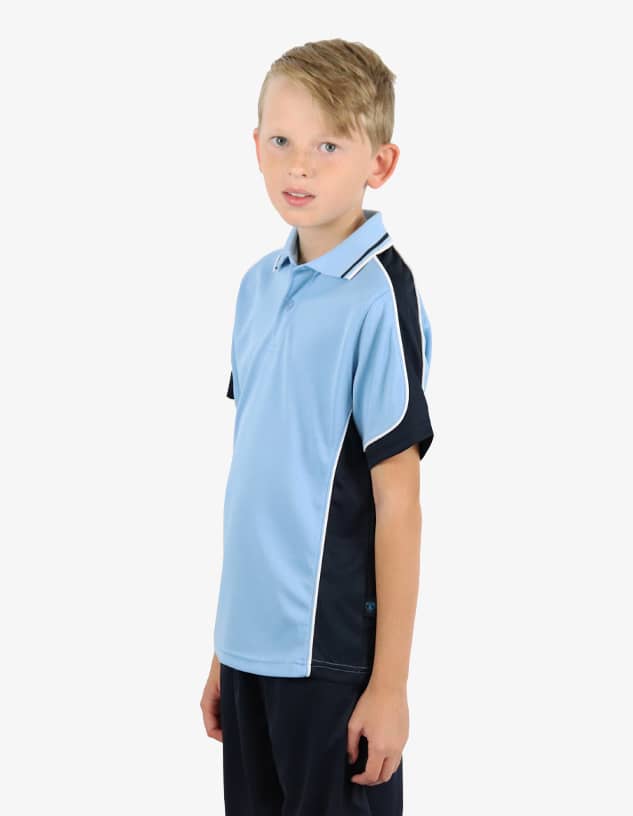 A polo shirt in light blue with black accents and a logo, worn by a young child.