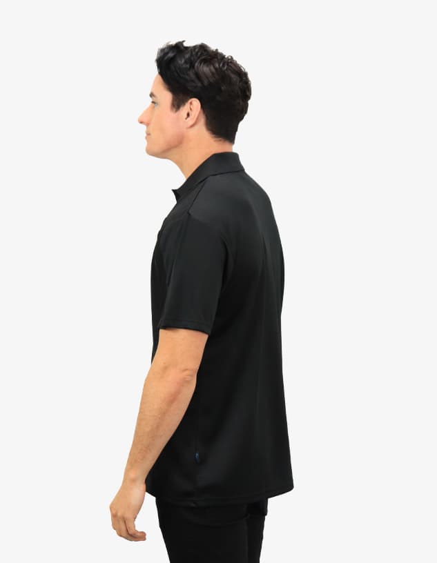 A black polo shirt is displayed, featuring a subtle logo and a classic, stylish design.