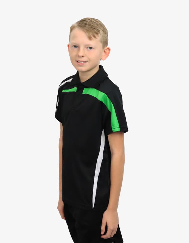 A black polo shirt with green and white accents, modelled by a young boy. The shirt features a logo.