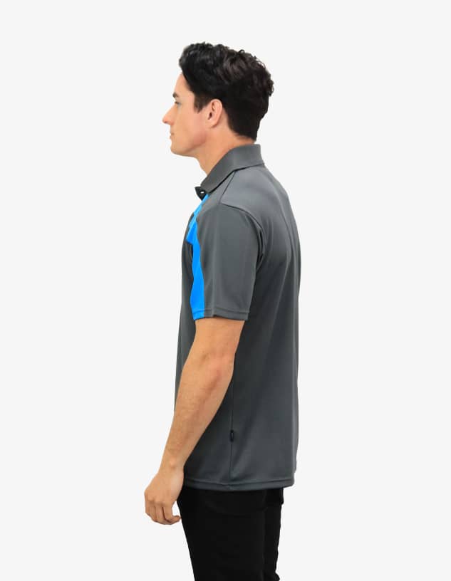 A grey polo shirt with blue accents, featuring a logo on the front. Model is standing sideways.