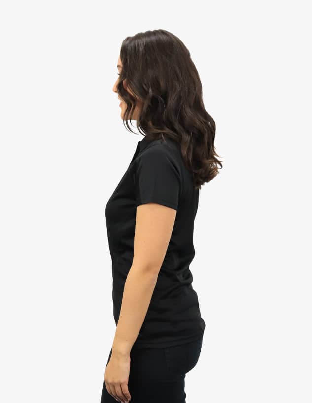 A black polo shirt displayed on a model from the side, showcasing its fitted design and style.