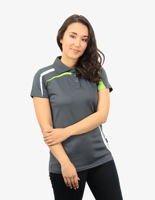 A grey polo shirt with green accents, featuring a collar and buttons, modelled by a woman.