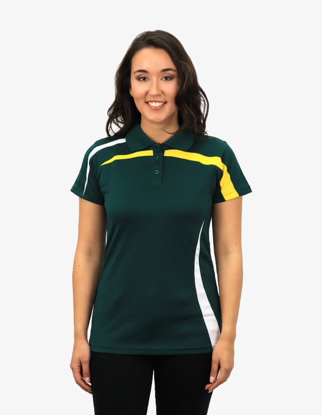 A green polo shirt with yellow and white accents, featuring a logo. Modelled by a woman smiling.