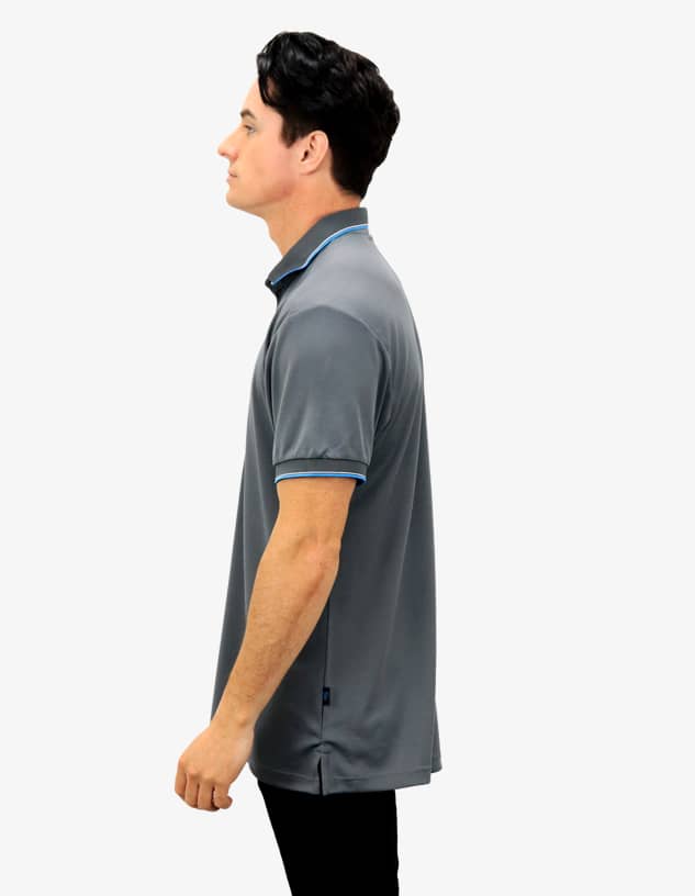 A grey polo shirt featuring a contrasting blue collar and sleeves, displayed on a model from the side.