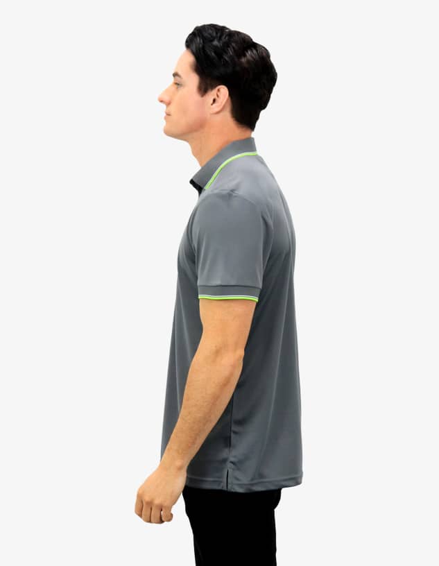 A grey polo shirt with green accents, featuring a collar and short sleeves. The shirt has a logo.
