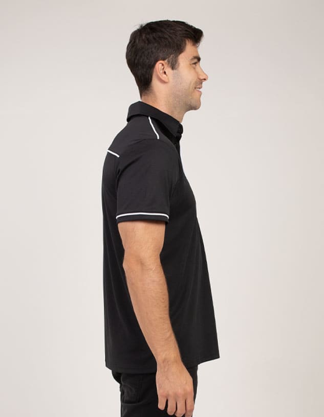 A black polo shirt with white trim and a logo, featuring a classic collar and a side view of the model.