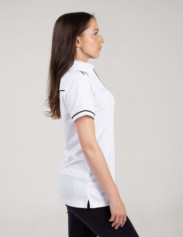 A white polo shirt with black trim, featuring a collar and a side slit, displayed on a model from the side.