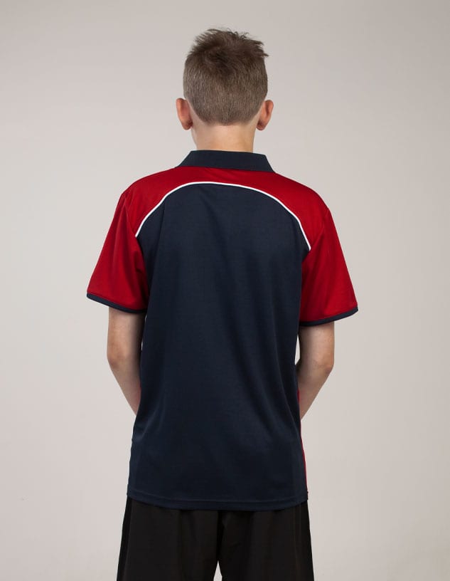 A polo shirt featuring a navy blue base with red accents and a logo on the back.