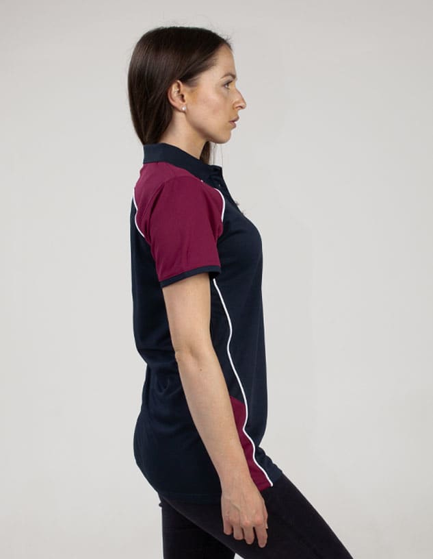 A polo shirt featuring a navy body with maroon sleeves and white accents. It includes a logo on the front.