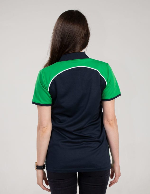 A polo shirt featuring a dark navy body with green sleeves and a logo on the collar.