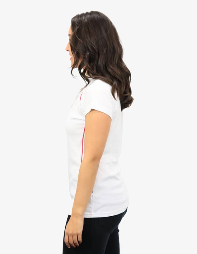 A white polo shirt with pink detailing, featuring a simple design and a branded logo.