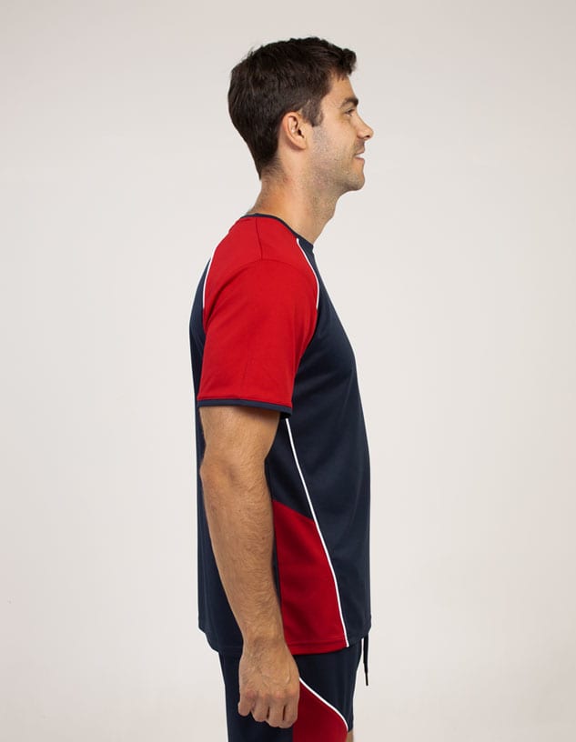 A navy blue and red T-shirt featuring a logo, displayed on a model from the side.