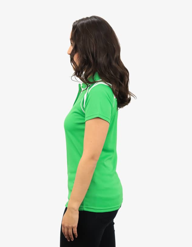 A green polo shirt with white detailing, worn by a person facing sideways. The shirt features a logo.