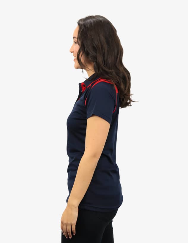 A navy polo shirt with red detailing, featuring a logo. Side view of a model wearing the shirt.
