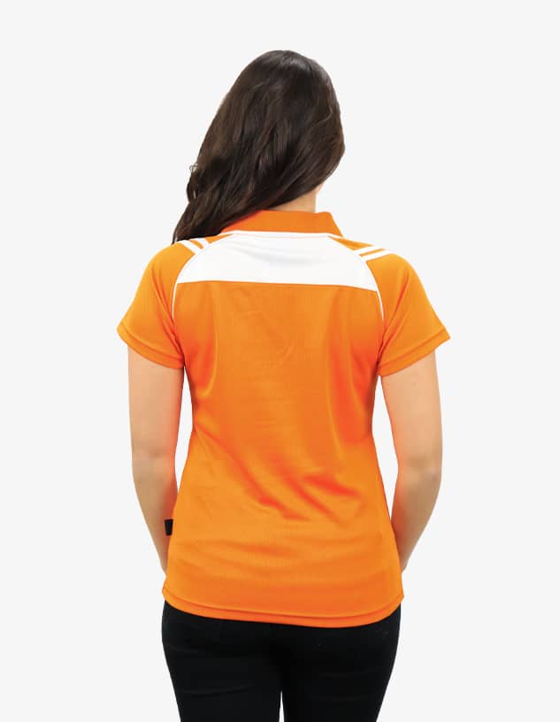 An orange polo shirt featuring white details, viewed from the back on a model. The shirt has a logo.