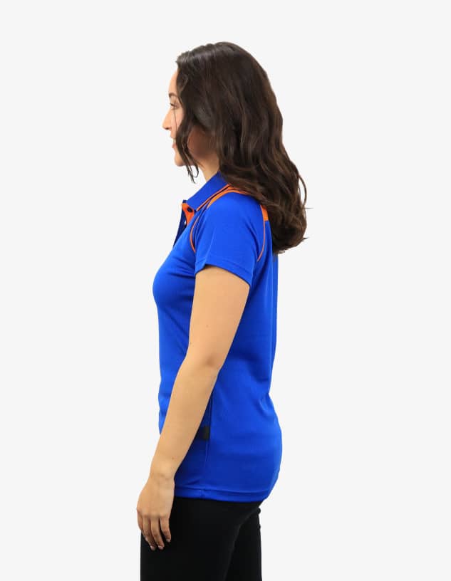 A blue polo shirt featuring orange accents, displayed on a model from the side. It has a logo on the chest.