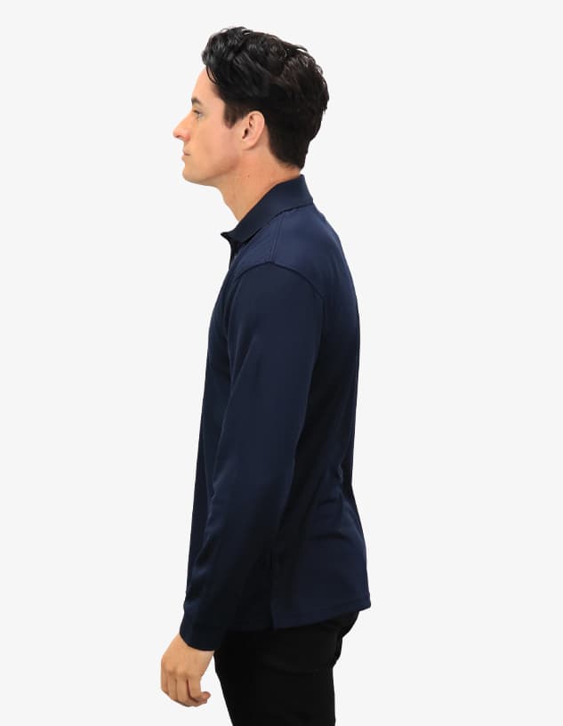 A navy polo shirt displayed on a male model, featuring a collar and a fitted design. The shirt has a logo.