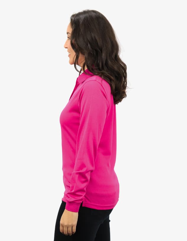 A pink polo shirt displayed on a model from a side view, featuring a logo on the chest.