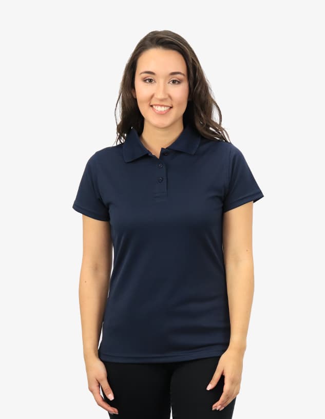 A navy blue polo shirt featuring a classic collar, displayed on a smiling model. It has a logo on the chest.