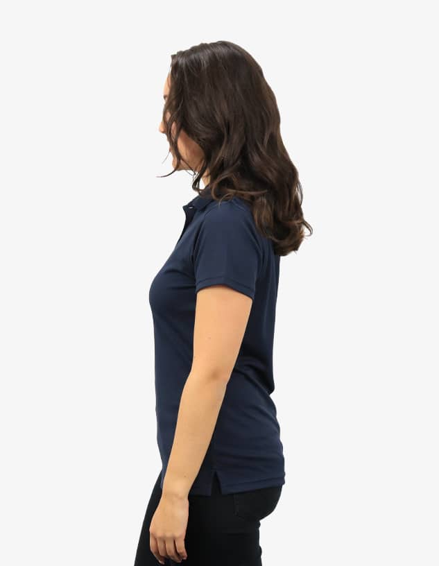 A navy blue polo shirt displayed on a model from the side, featuring a fitted style and a logo.