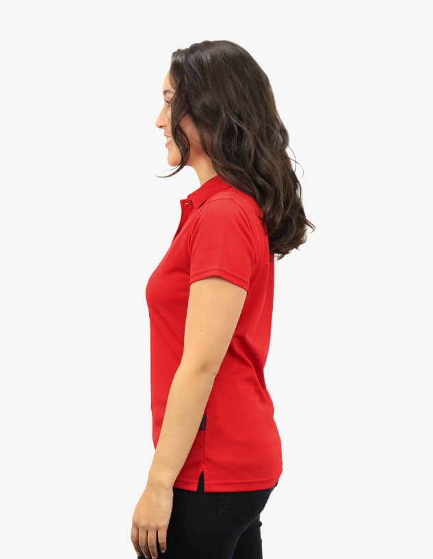 A red polo shirt displayed on a model from the side, featuring a logo on the garment.
