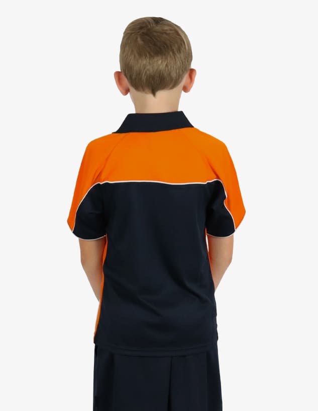 A polo shirt in orange and navy blue, featuring a logo, viewed from the back on a child.