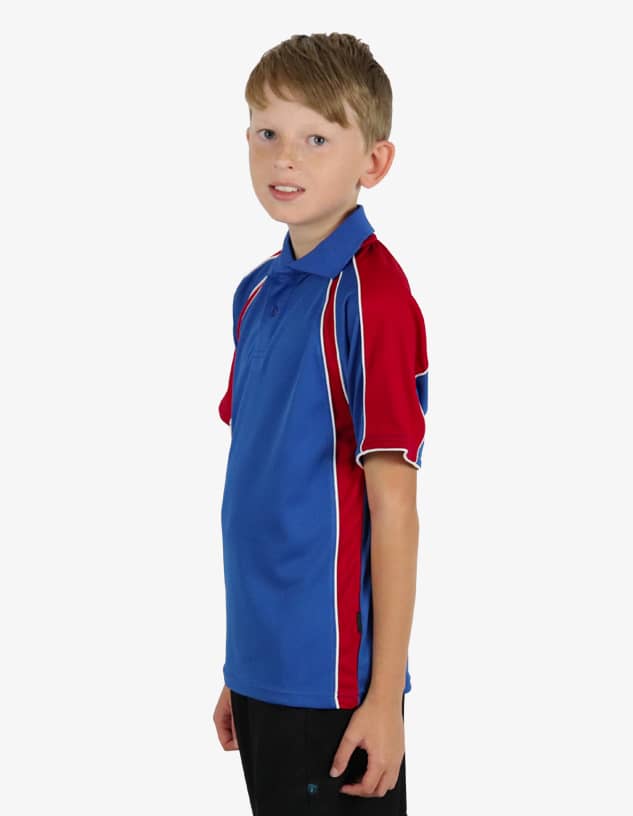 A blue and red polo shirt featuring white accents, displayed on a young model. The shirt has a logo on it.