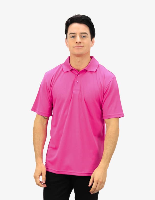 A polo shirt in vibrant pink, featuring a collar and a logo. The model is standing against a plain background.