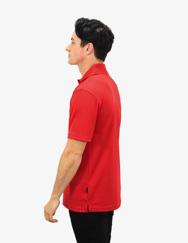 A red polo shirt is displayed, featuring a classic design and a logo on the chest.