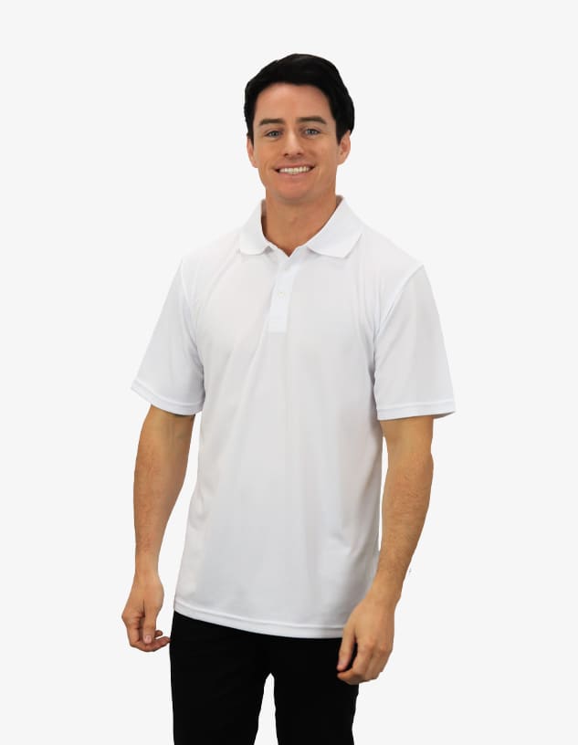 A white polo shirt modelled by a smiling individual, featuring a collar and short sleeves. The shirt has a logo.