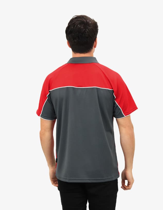A polo shirt featuring a red and grey design, with a logo on the back, displayed on a model facing away.