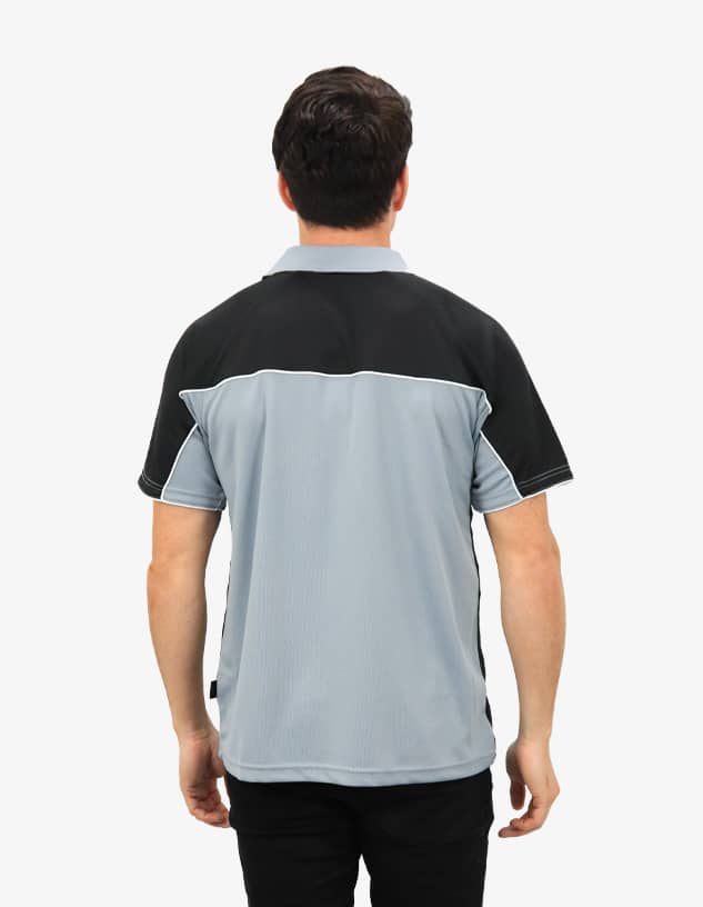 A polo shirt in grey and black with a contrasting design and a logo on the back.