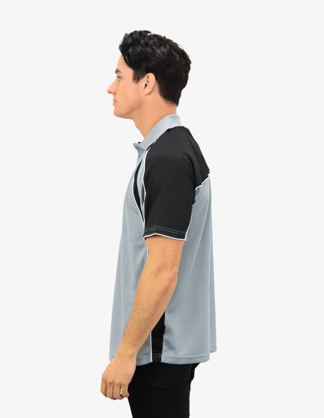 A polo shirt in light grey with black accents and stitching, featuring a logo on the front.