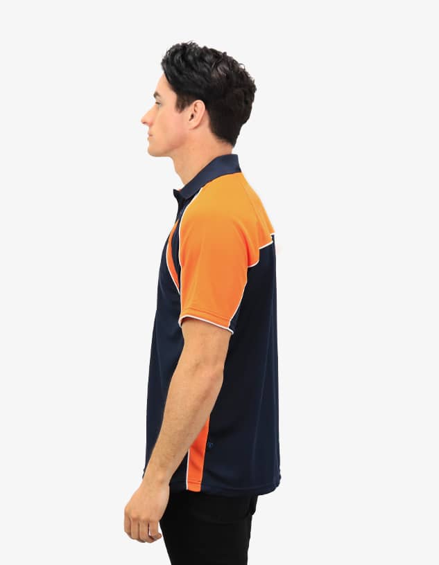 A navy and orange polo shirt with a logo, displayed on a model from the side.