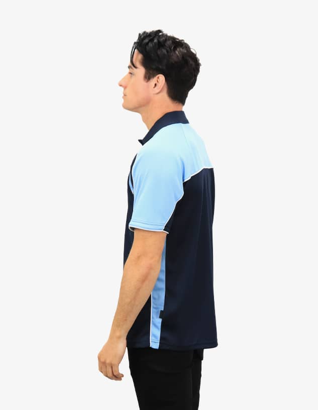 A navy and light blue polo shirt on a model, featuring a logo on the chest. The shirt has a modern, sporty design.