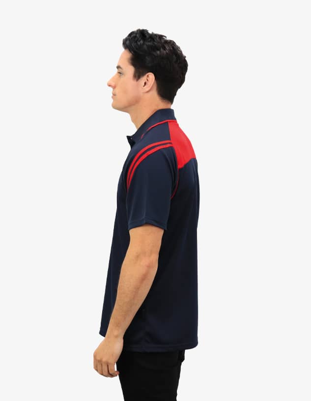 A men's polo shirt featuring a navy blue body with red accents and a logo. The shirt has a collared design.