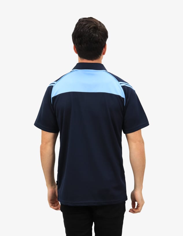 A navy blue polo shirt with light blue shoulders and a logo on the back, worn by a person facing away.