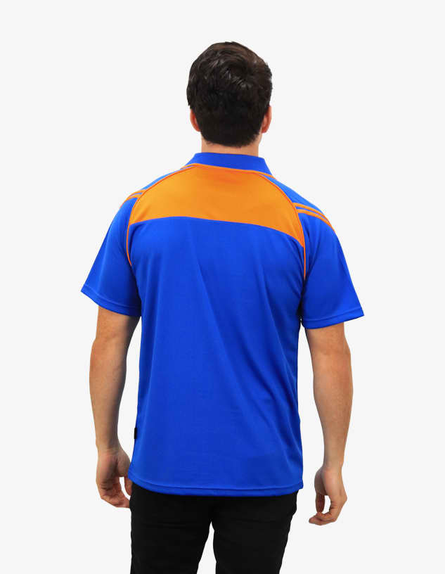 A man wearing a blue and orange polo shirt with a logo on the back.