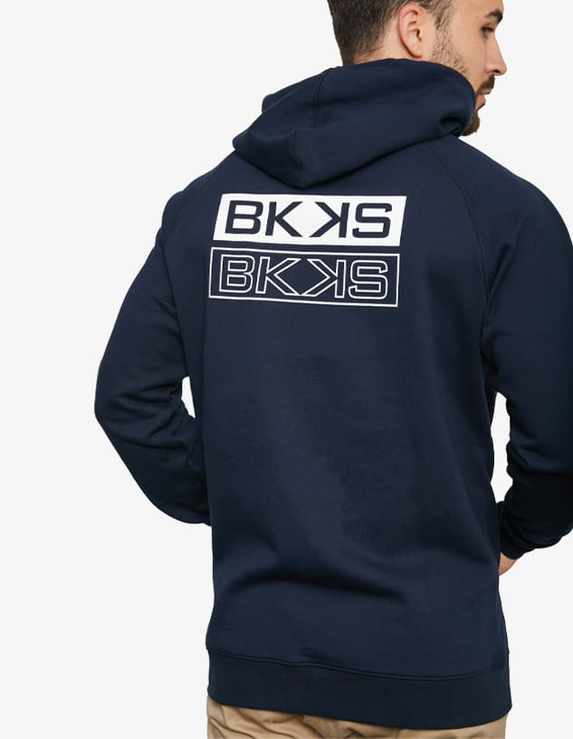 A navy blue hoodie with a branded logo on the back and a front kangaroo pocket.