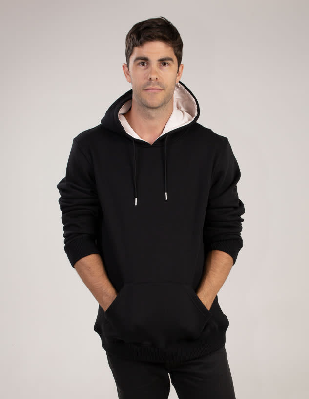 A black hoodie with a contrasting inner hood, featuring a front pocket and a logo.