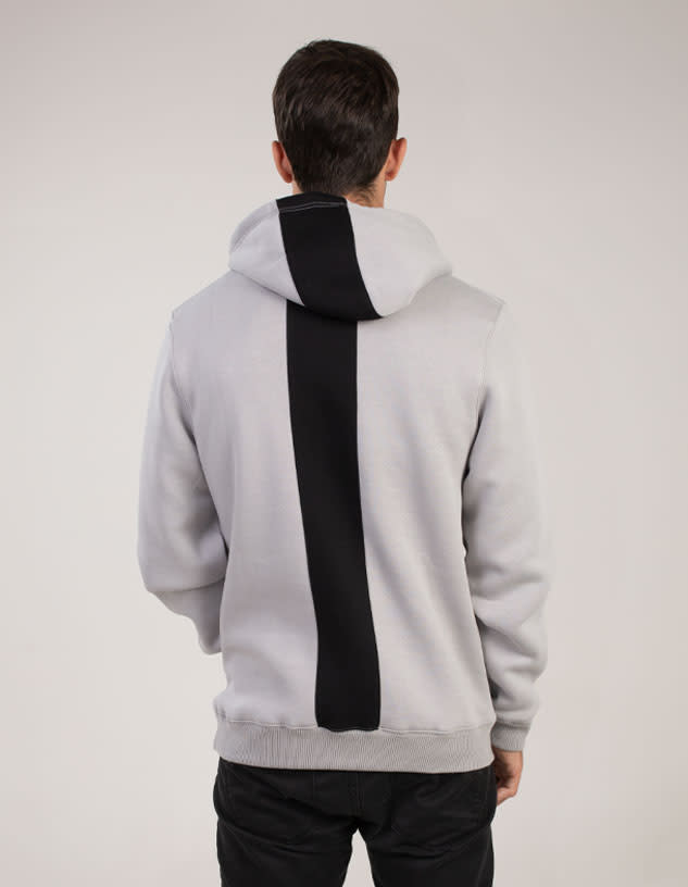 A grey hoodie with a black stripe down the back and a hood. The design features a logo on the garment.