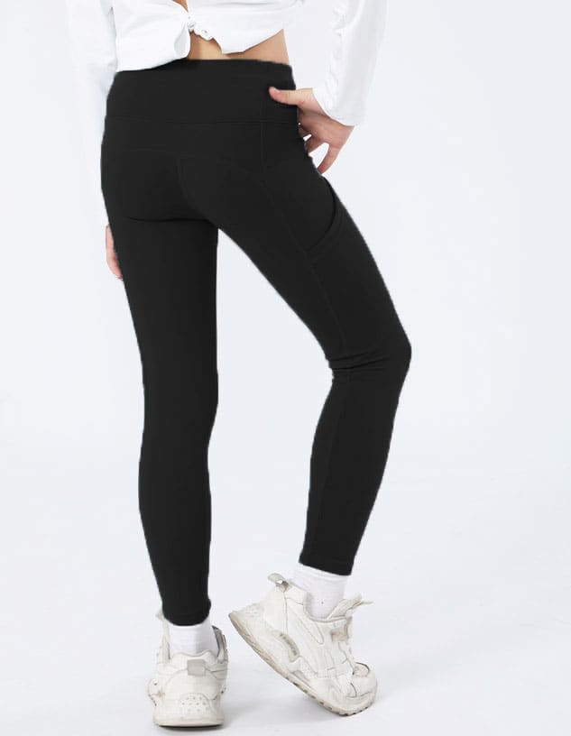 Black girl's leggings displayed in a rear view, featuring a snug fit and a waistband, paired with casual shoes.