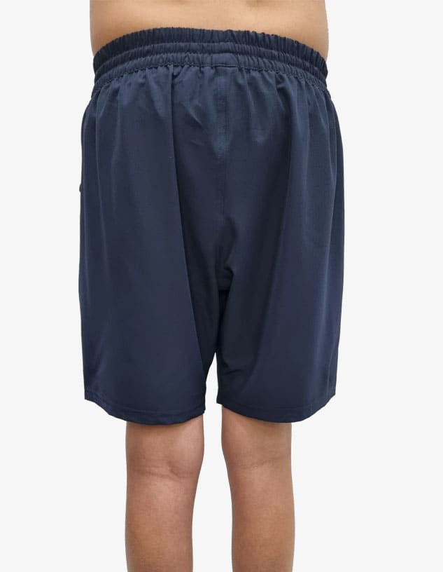 Navy sports shorts with an elastic waistband, featuring a logo on the back. Suitable for active wear.