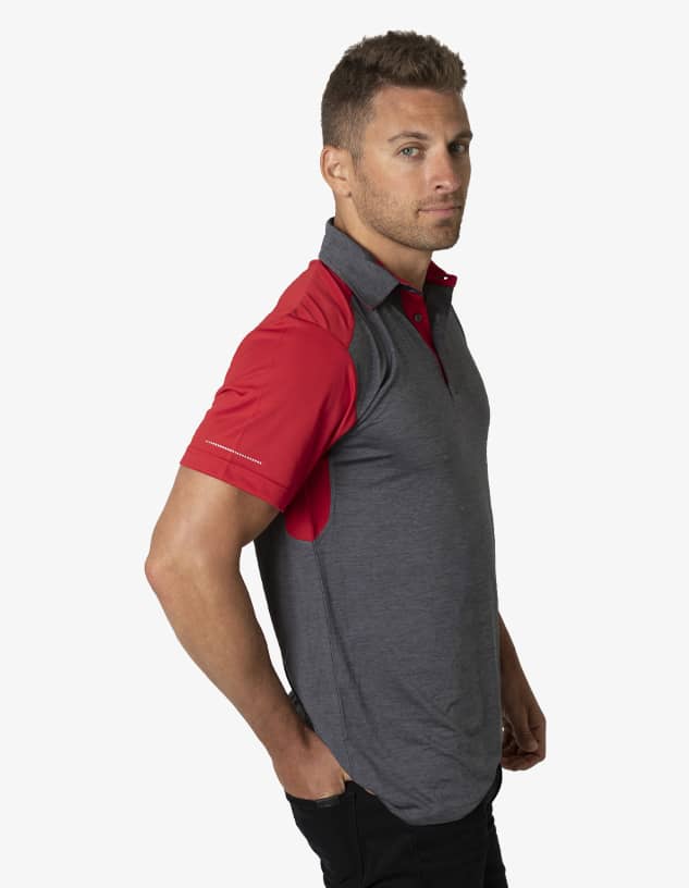 A polo shirt featuring a grey body with red sleeves and a logo on the side.