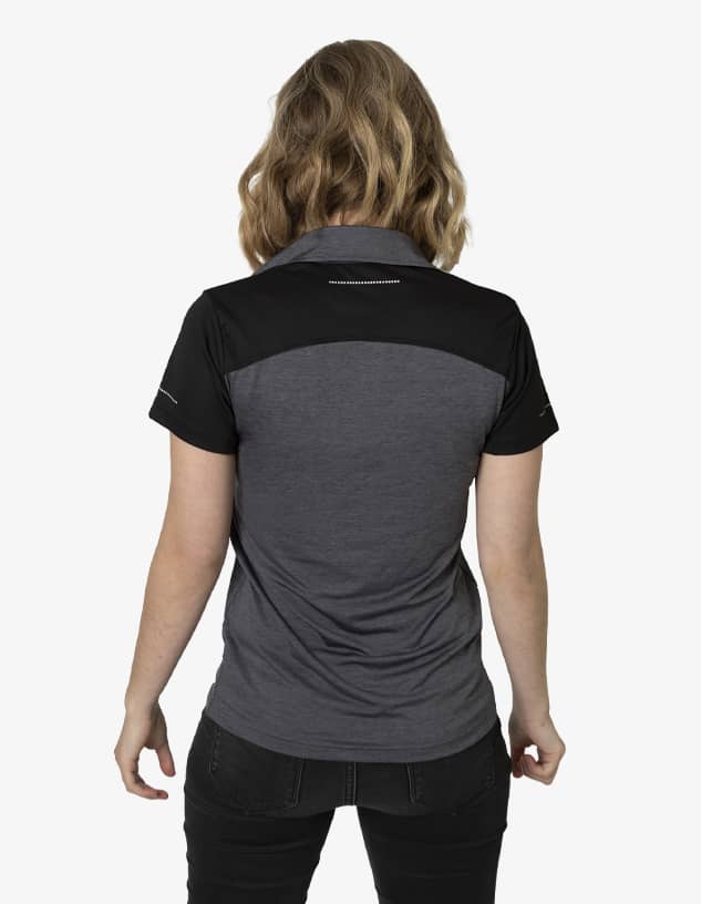 A grey polo shirt with a black upper back, featuring a logo. Ideal for casual or professional wear.